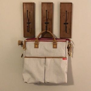 SkipHop cross body diaper bag